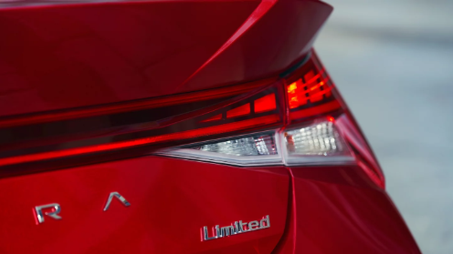 2024 red Hyundai Elantra rear exterior close up shot.