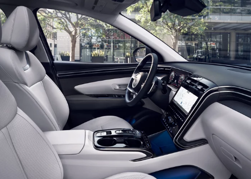 2024 Hyundai Tucson interior leather seating and high tech dash features.