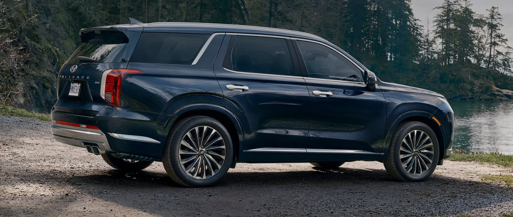 2024 Hyundai Palisade parked on a shoreline.