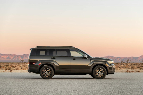 Hyundai Santa Fe parked in front of a California sunset.