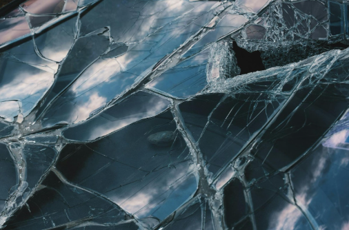 Close up on a cracked winshield.